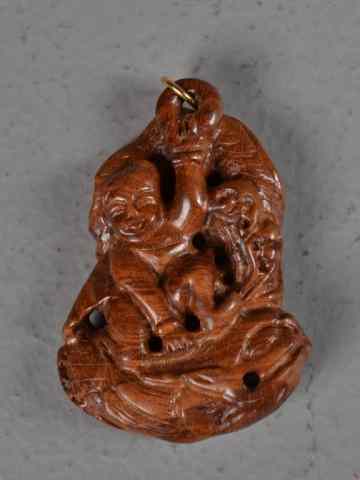 Appraisal: Chinese Boxwood Carved PendantFinely carved to depict a boy at