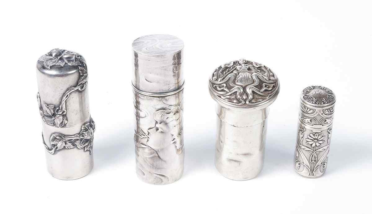 Appraisal: ART NOUVEAU STERLING CONTAINERS To include Unger Brothers smoking woman