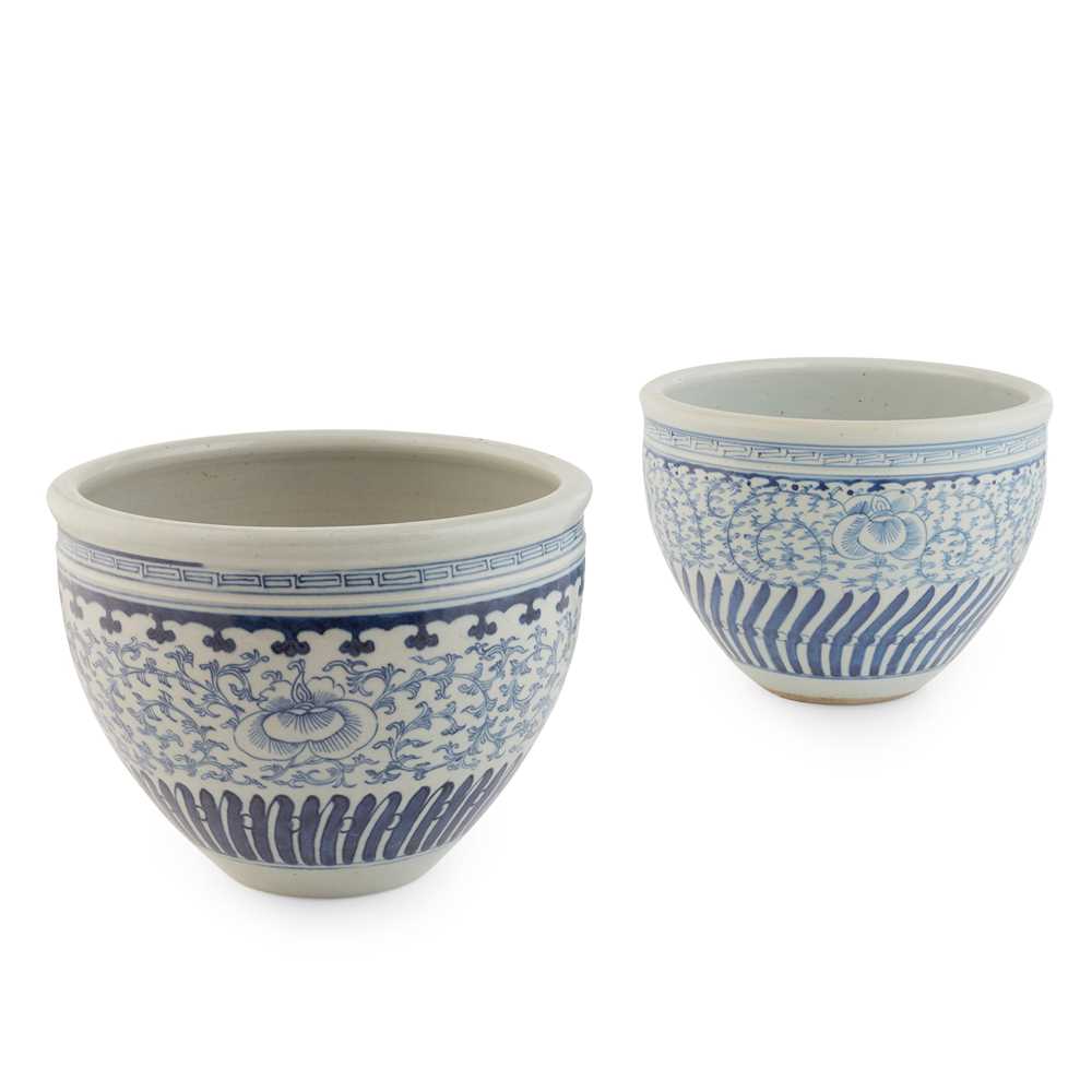 Appraisal: NEAR PAIR OF BLUE AND WHITE JARDINIERES each of tapered