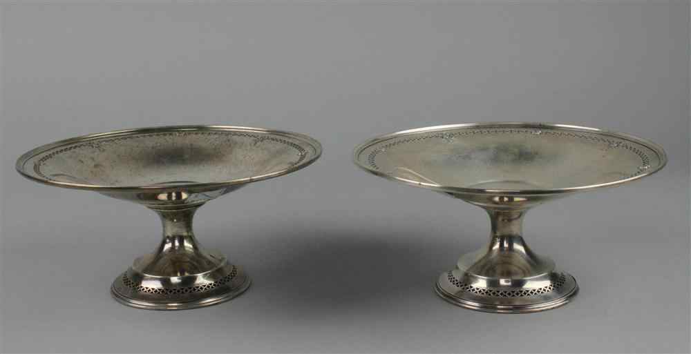 Appraisal: PAIR OF AMERICAN SILVER FOOTED DISHES with alternating swags and