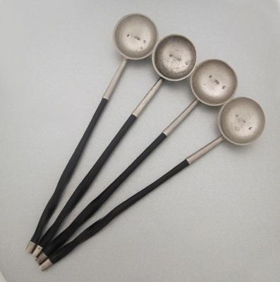 Appraisal: A set of four George III Scottish toddy ladles with