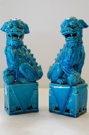 Appraisal: PAIR OF TURQUOISE GLAZED BUDDHIST LIONS