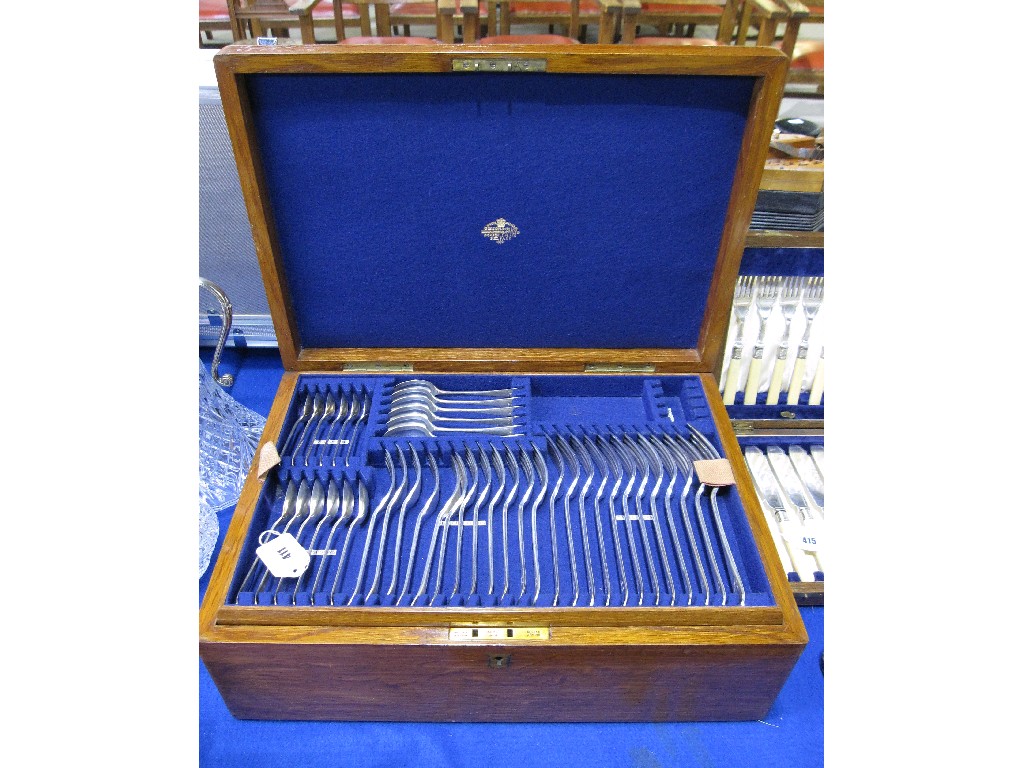 Appraisal: Cased part cutlery set in mahogany canteen piece