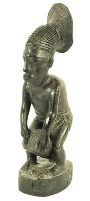 Appraisal: An early th century Congo carved ebony figure of a