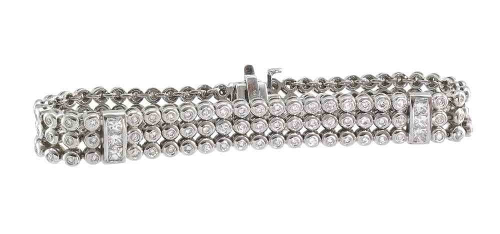 Appraisal: K TRIPLE STRANDS OF DIAMONDS BRACELET K white gold bracelet