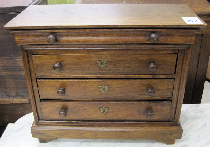 Appraisal: SALESMAN'S SAMPLE DIMINUTIVE CHEST OF DRAWERS French th century featuring