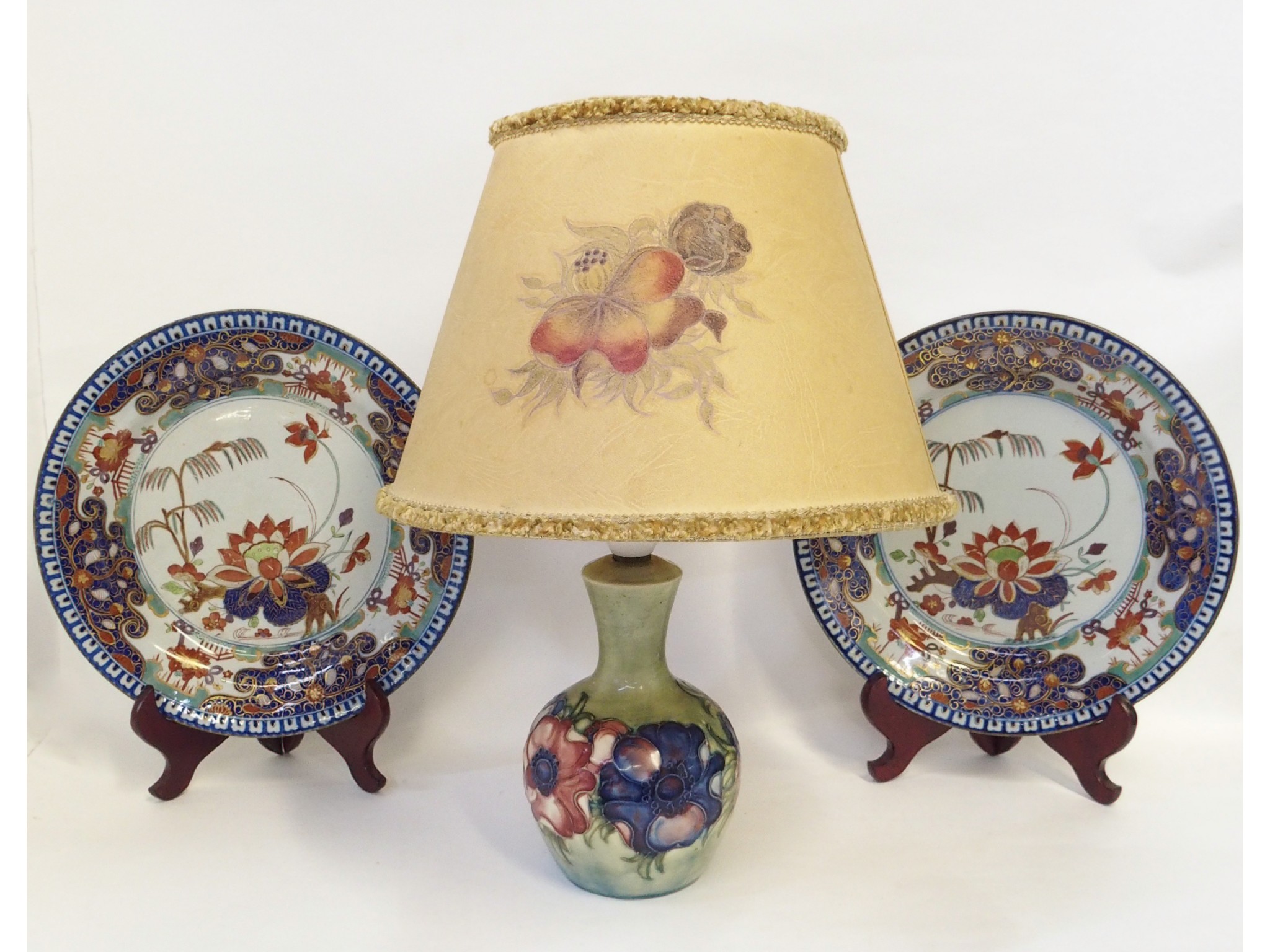 Appraisal: Moorcroft Anemone pattern table lamp with original shade together with