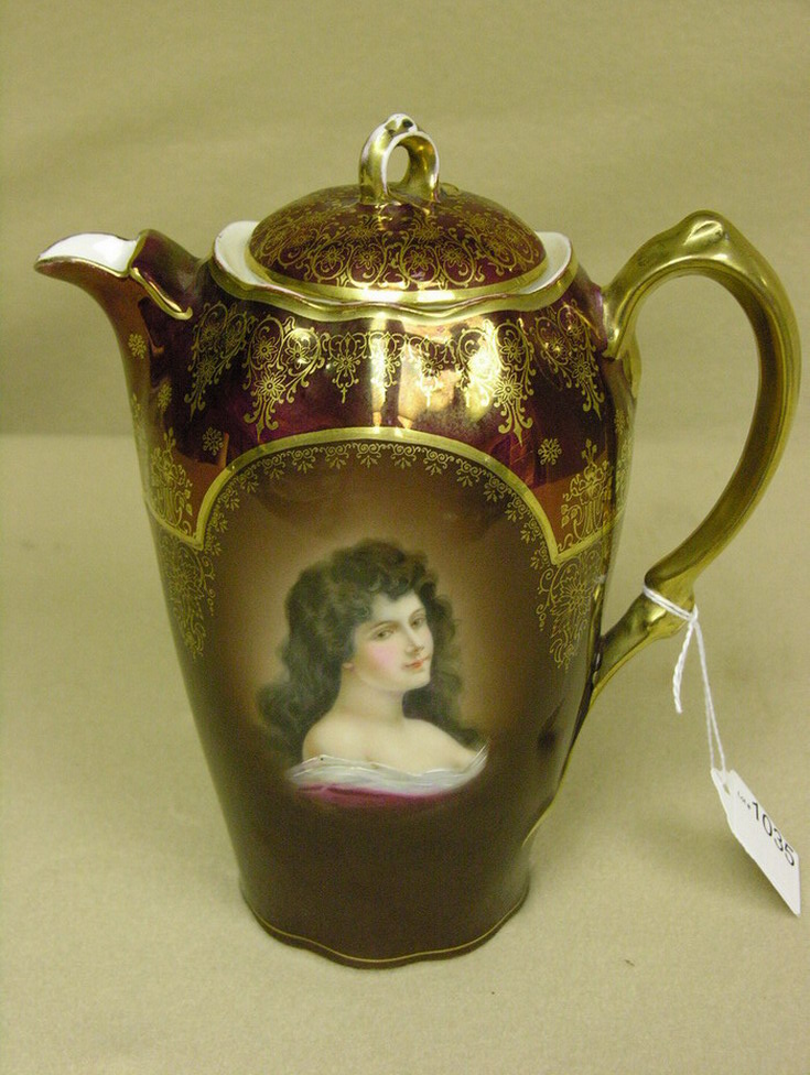 Appraisal: VIENNA PORTRAIT CHOCOLATE POT Stamped Mignon Z S and Co