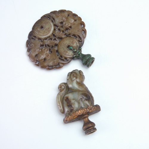 Appraisal: Two Asian finials one of soapstone carved withopposing butterflies and