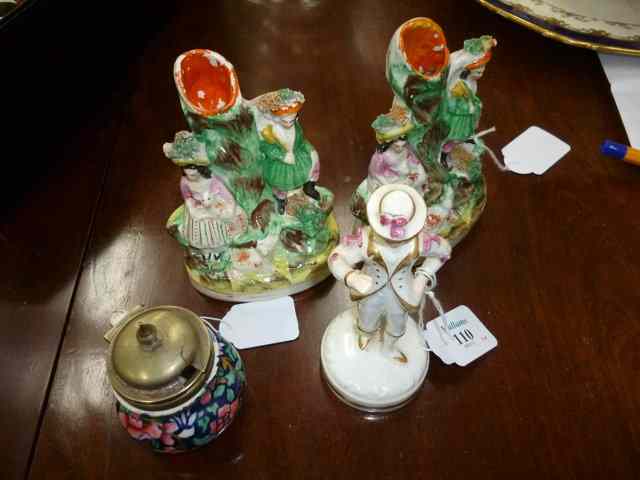 Appraisal: A PAIR OF STAFFORDSHIRE FLAT BACK SPILL VASES each with