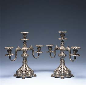 Appraisal: PAIR SILVER PLATED CANDELABRA Pair old silver plated candelabra with