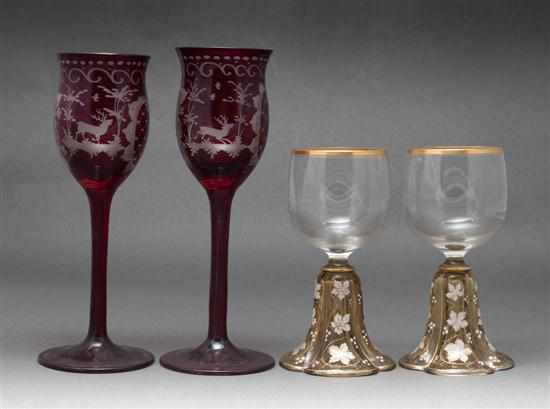 Appraisal: Pair of German enameled glass wine stems and a pair