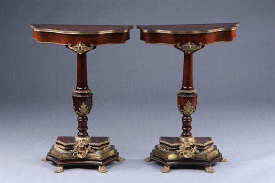 Appraisal: PAIR NAPOLEON III-STYLE CONSOLE TABLES th century walnut with burl