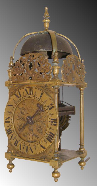 Appraisal: Brass lantern clock the chapter ring enclosing a floral engraved