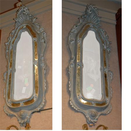 Appraisal: Pair of Italian Rococo Style Silvered Wood Etched Mirrors Estimate