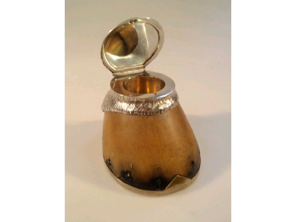 Appraisal: A Victorian horses hoof ink well with silver mounted lid