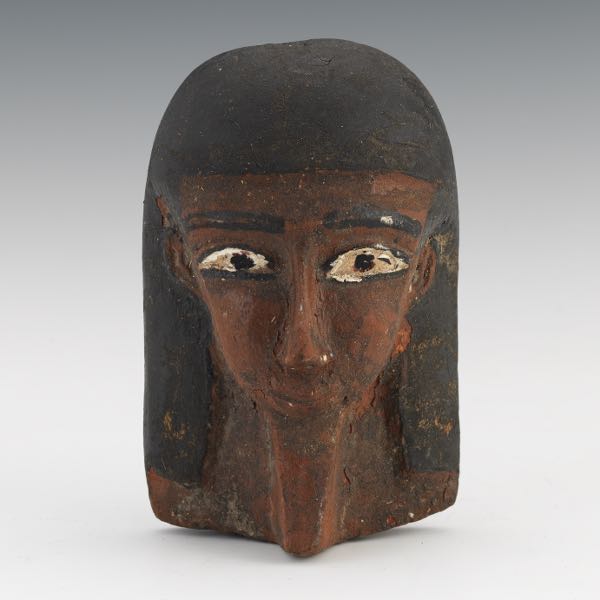 Appraisal: EGYPTIAN CARVED WOOD MASK x x Egyptian polychromed wood funerary