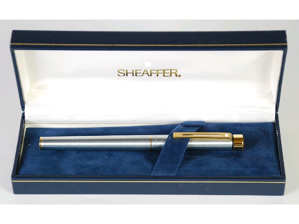 Appraisal: BOXED SHEAFFER FOUNTAIN PEN brushed steel and gilt metal case