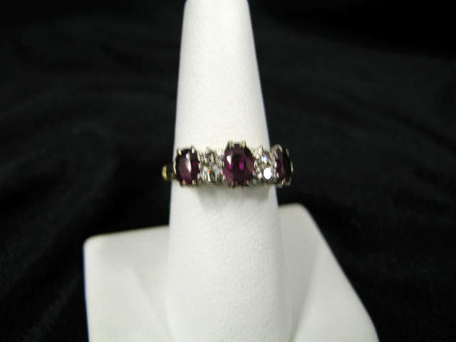 Appraisal: Ruby Diamond Ring oval rubies and six diamonds in k