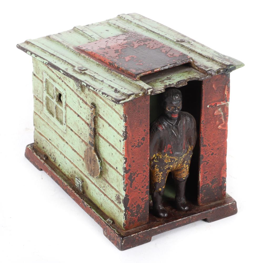 Appraisal: J E STEVENS CAST IRON 'CABIN' MECHANICAL BANK CA J