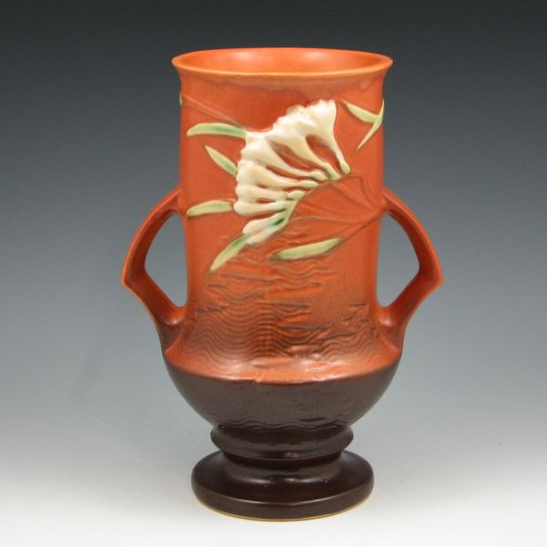 Appraisal: Roseville Freesia handled vase in brown Marked Roseville USA -