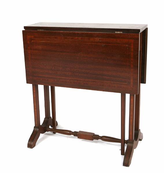 Appraisal: An Edwardian mahogany inlaid drop-leaf small table th century height