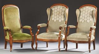 Appraisal: Group of Three French Carved Walnut Voltaire Style Armchairs late