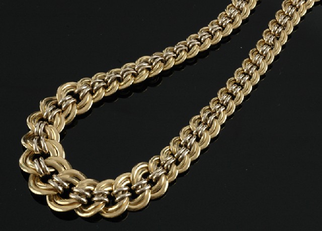 Appraisal: A wide gold collar Comprising double graduating fancy ltwo tone