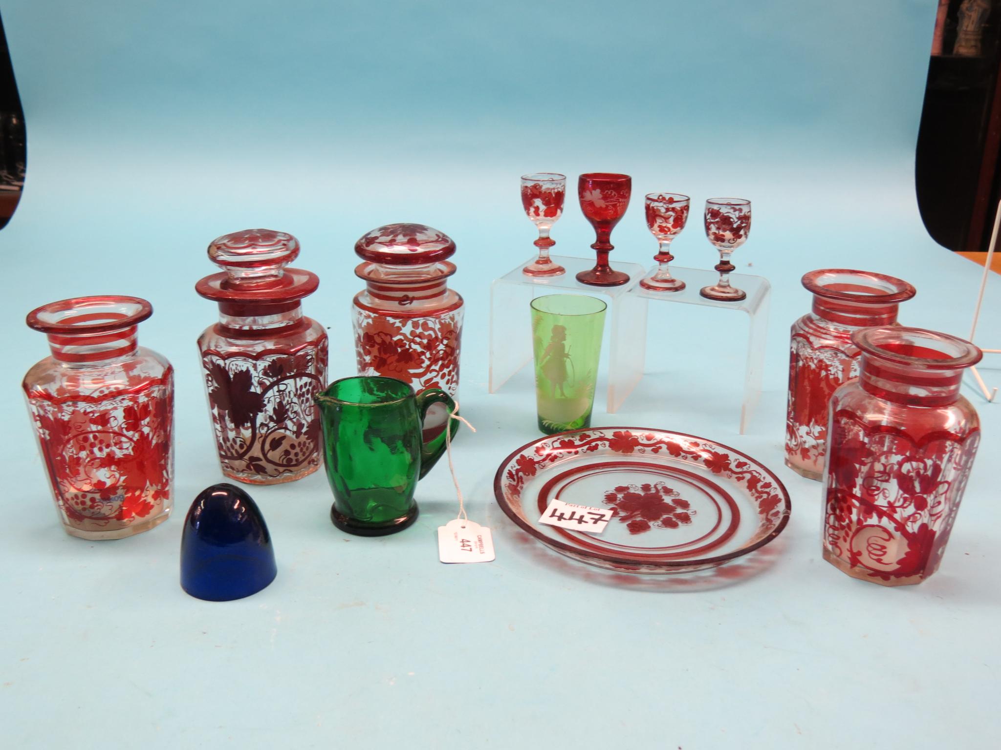 Appraisal: A set of three Victorian ruby-overlaid glass pickle jars in