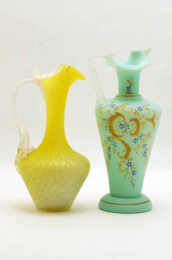 Appraisal: Two Victorian ewers one in yellow satin glass with zig-zag