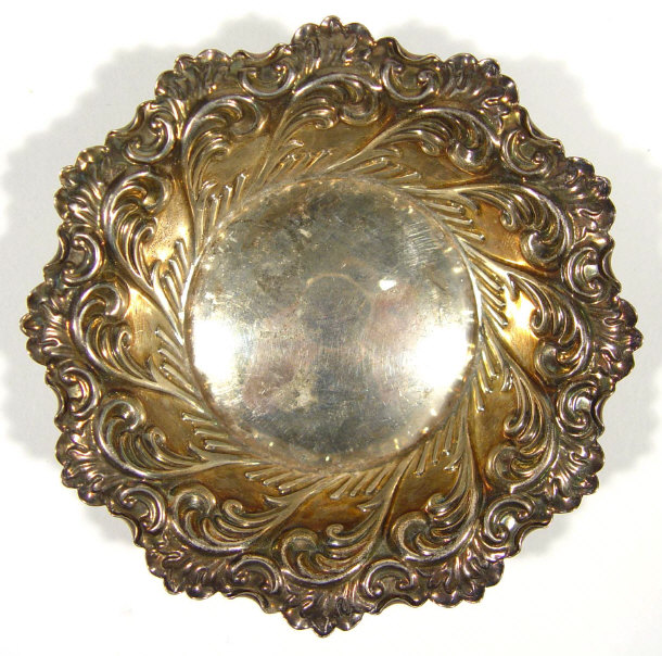 Appraisal: Victorian silver dish with embossed rim Sheffield cm diameter