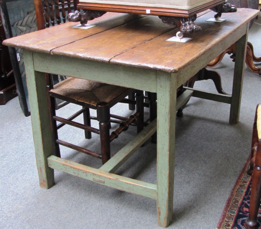 Appraisal: A th century Irish pine kitchen table the plank top