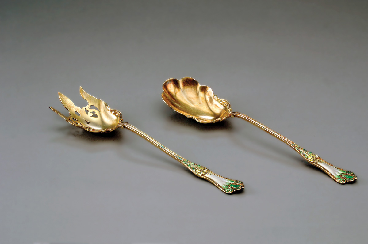 Appraisal: AMERICAN SILVER-GILT AND ENAMEL SALAD FORK AND SPOON HOWARD STERLING