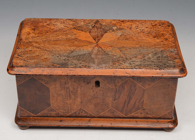 Appraisal: A NEW ZEALAND SPECIMEN WOOD RECTANGULAR BOX with hinged rising