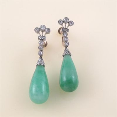 Appraisal: A pair of diamond and jade drop earrings the pear