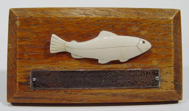 Appraisal: Carved ivory fish mounted on a oak stand with silver