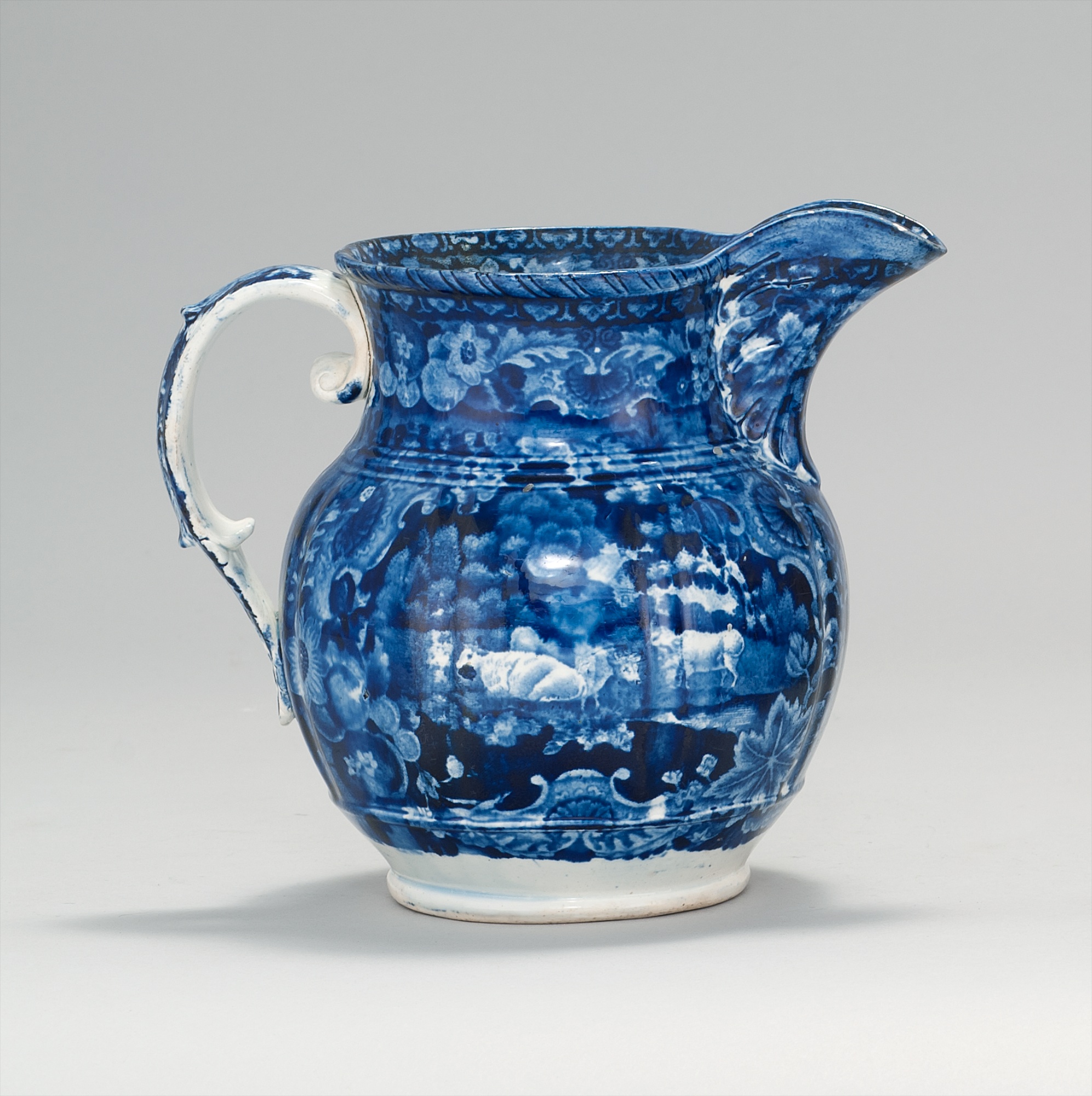 Appraisal: BLUE AND WHITE STAFFORDSHIRE PITCHER Mid- th CenturyBy Adams China