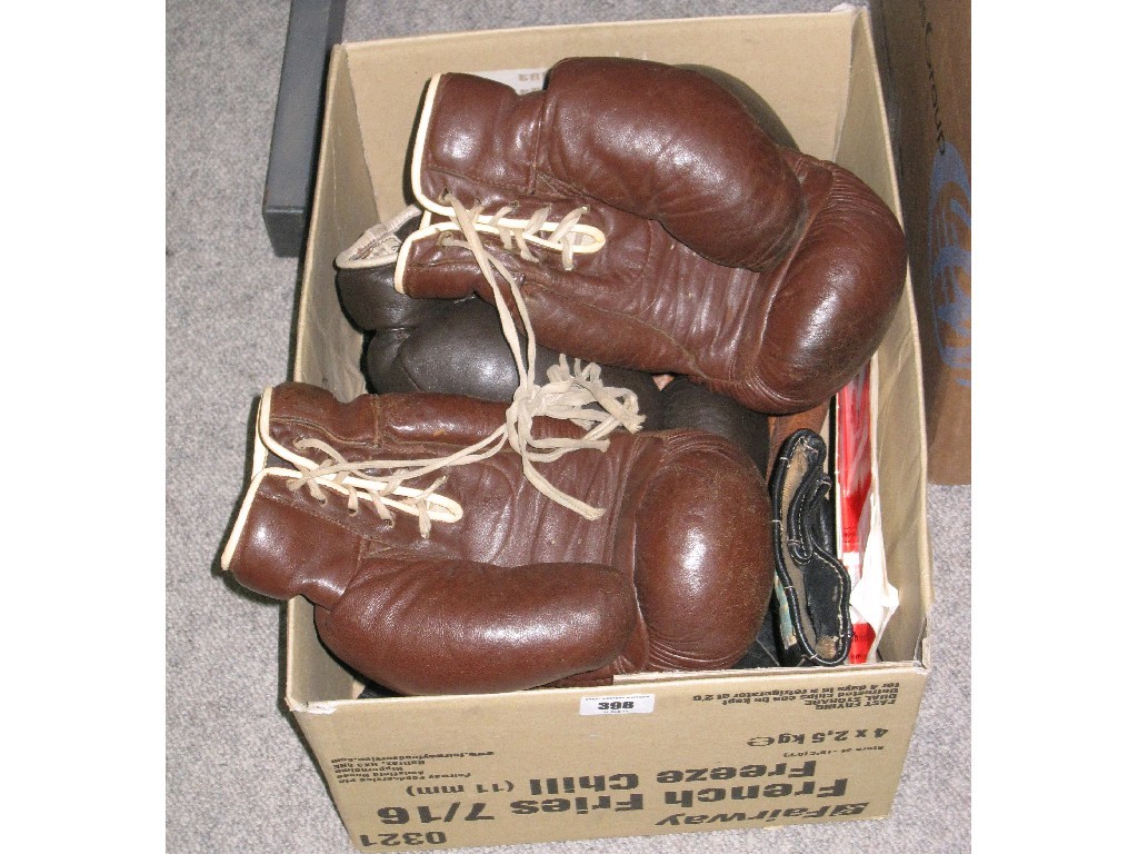 Appraisal: Box of boxing gloves and a Muhammad Ali v's Ken