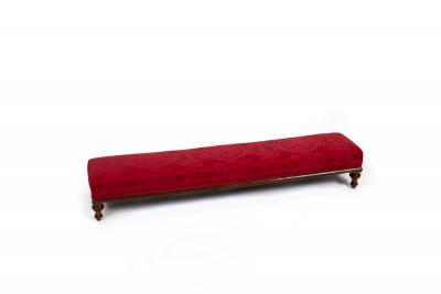 Appraisal: A Victorian fender stool the rectangular top upholstered in red