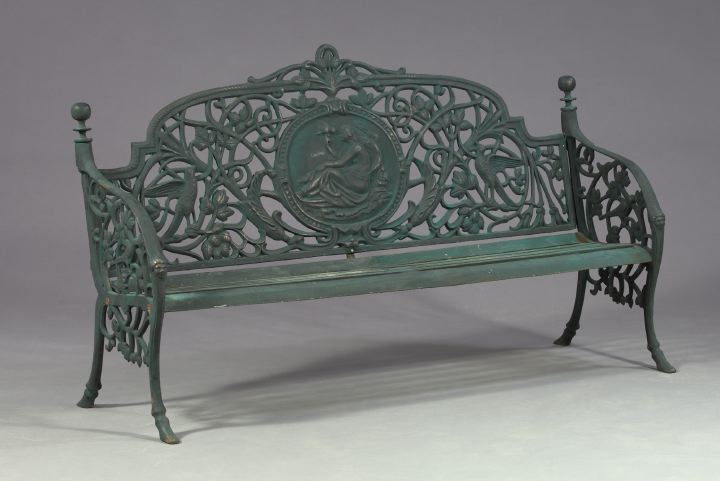 Appraisal: Victorian-Style Black Patinated Cast-Iron Garden Bench the pierced shaped avian