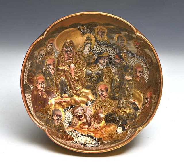 Appraisal: A JAPANESE SATSUMA BOWL with relief immortal and monkey decoration