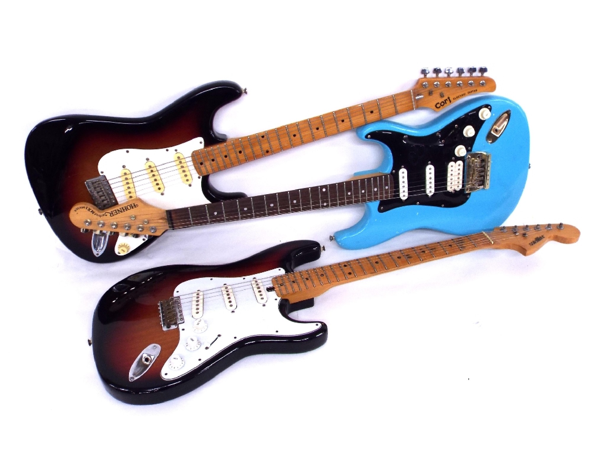 Appraisal: Three Stratocaster style electric guitars to include Satellite Hohner Cort