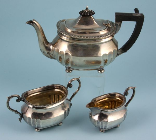 Appraisal: C - three piece Edwardian-style Birmingham sterling silver tea set