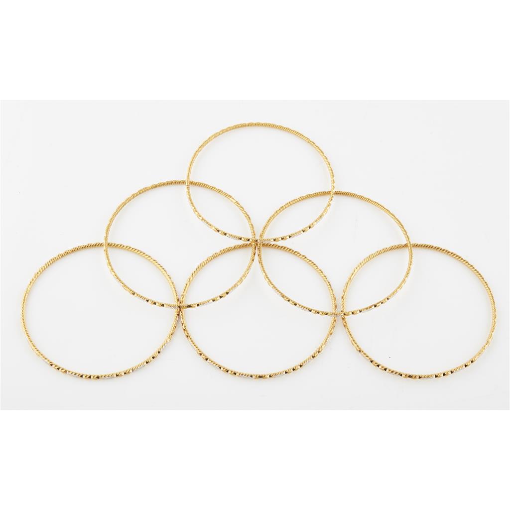 Appraisal: A set of six yellow metal bangles each of circular