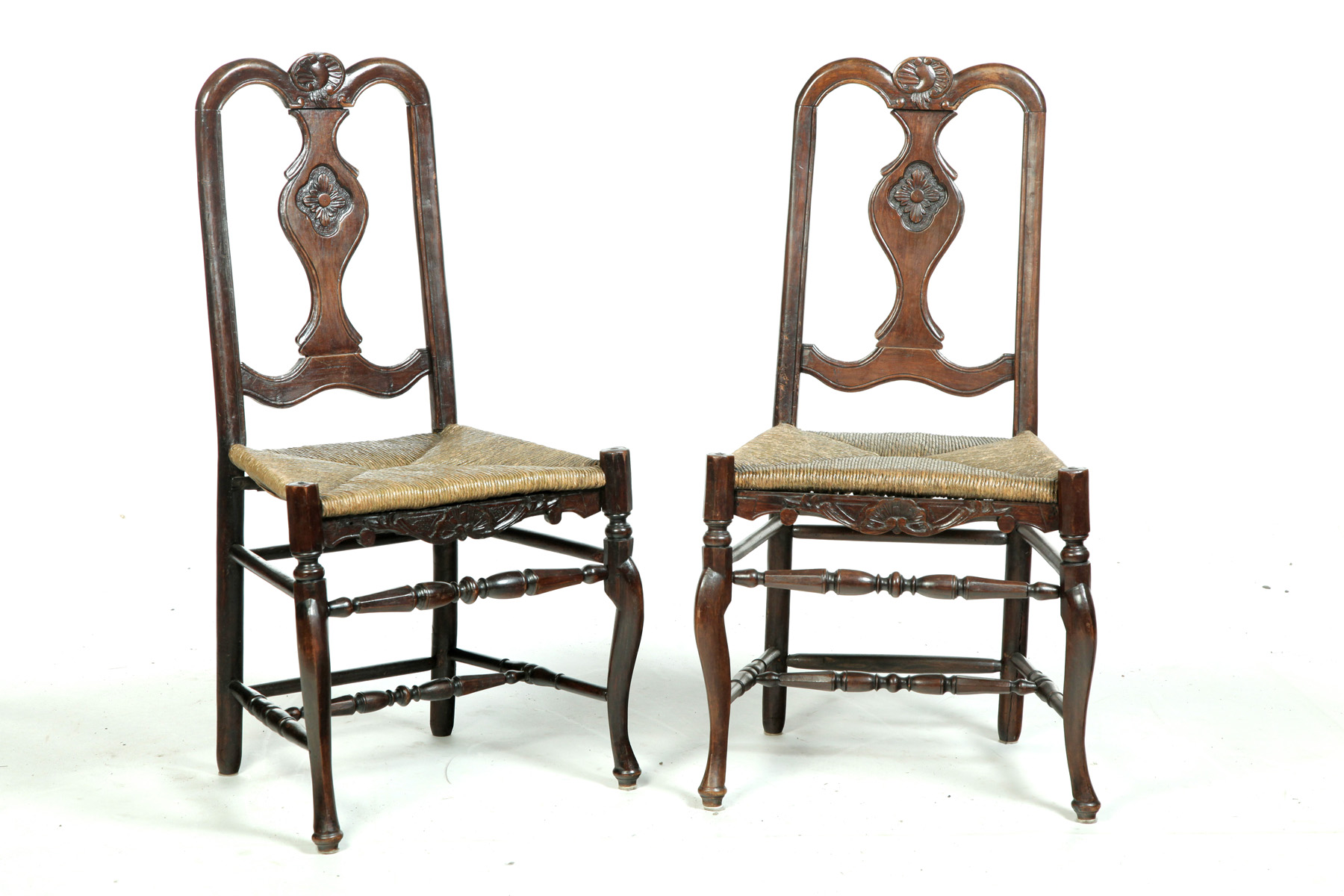 Appraisal: SET OF FOUR FRENCH COUNTRY CHAIRS Nineteenth century fruitwood Carved