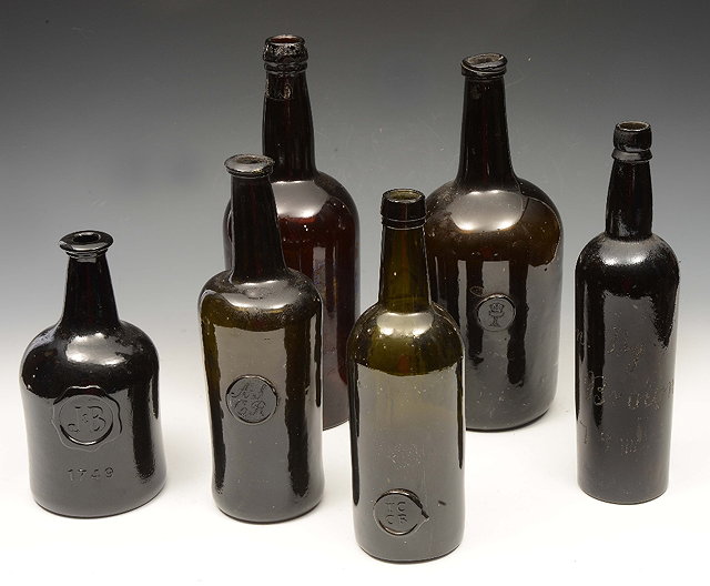 Appraisal: TWO TH CENTURY OXFORD COLLEGE SEALED WINE BOTTLES 'TCCR' Trinity