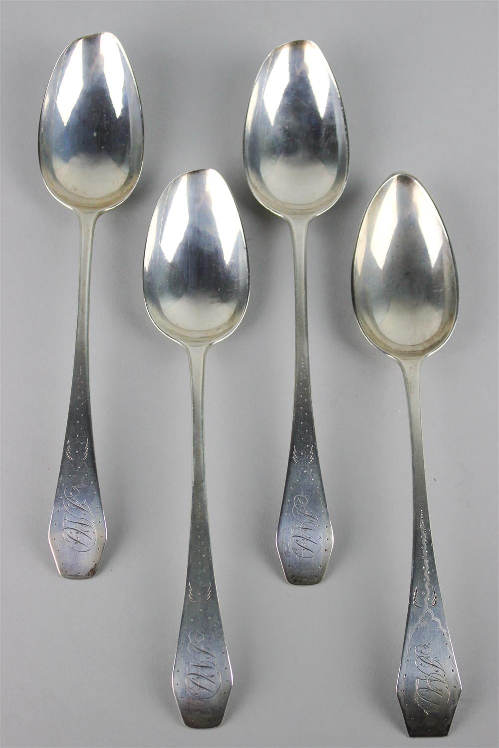 Appraisal: FOUR FREEMAN WOODS COIN SILVER SPOONS marked Woods and with