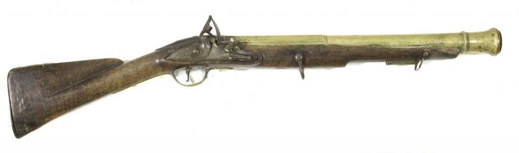 Appraisal: AN ENGLISH FLINTLOCK BLUNDERBUSS DATED the cylindrical brass swamped barrel