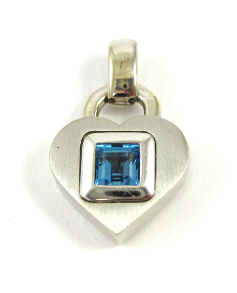 Appraisal: BLUE TOPAZ AND FOURTEEN KARAT GOLD PENDANT The white gold