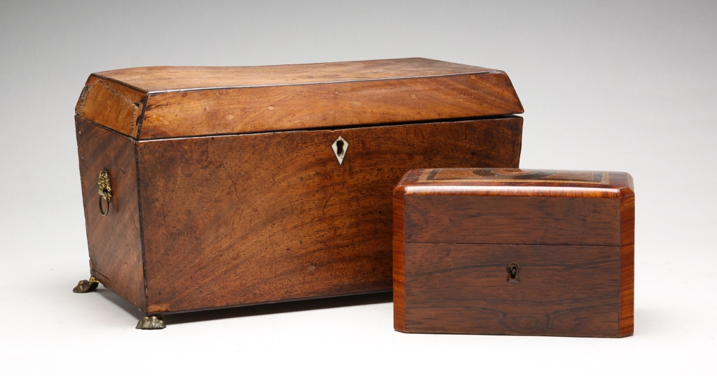 Appraisal: TWO ENGLISH CADDIES Nineteenth century Mahogany veneered tea caddy on